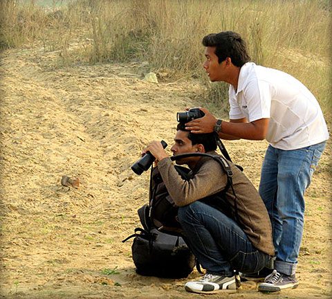 Birding is better with a friend. Photographer Shuvendu Das