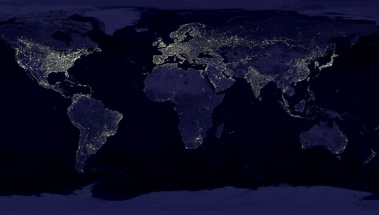 Lights on at night over the world. Photo by NASA via Wikimedia Commons.
