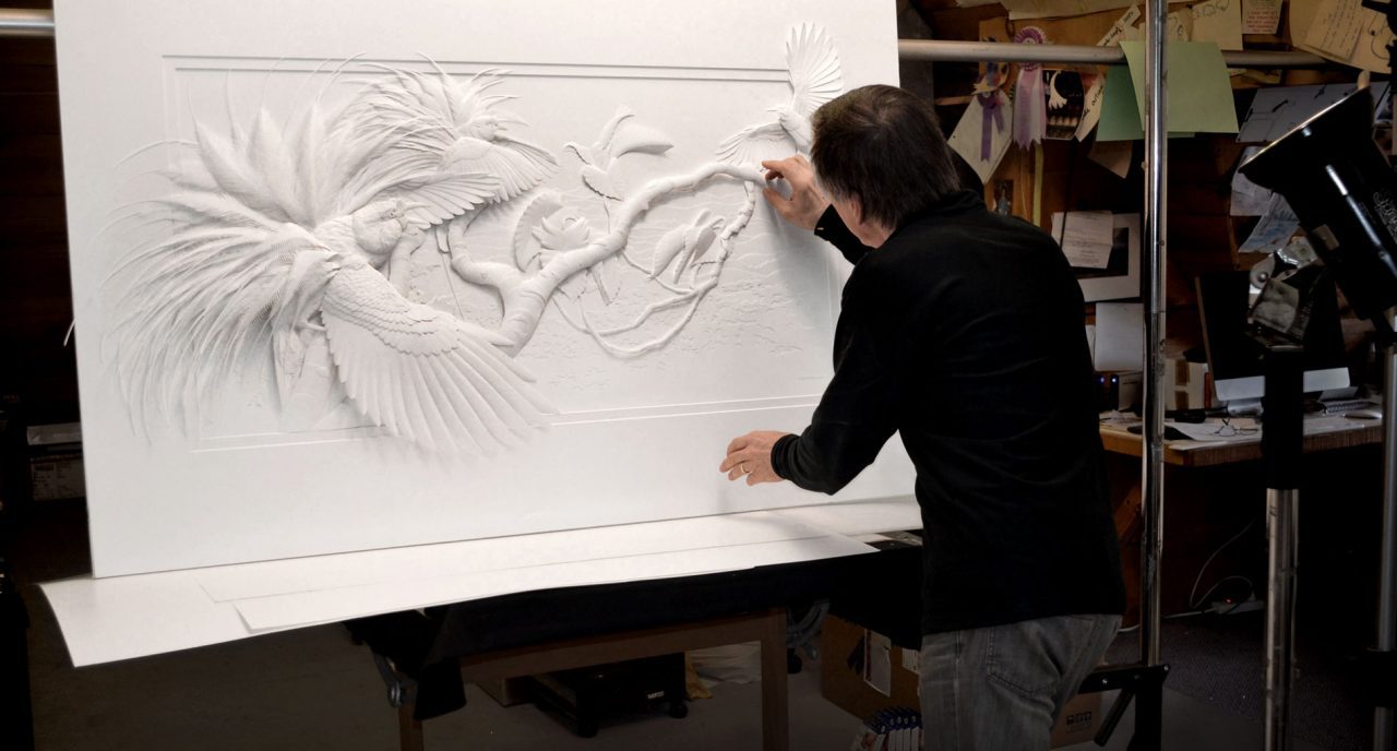 Calvin Nicholls works on a bird-of-paradise project. Photo by Pat Leonard.