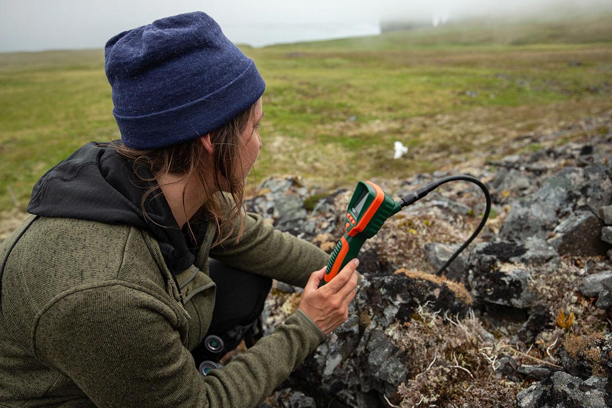 Using a scope, Richardson can check on the status of nests hidden from view. Photo by Andy Johnson