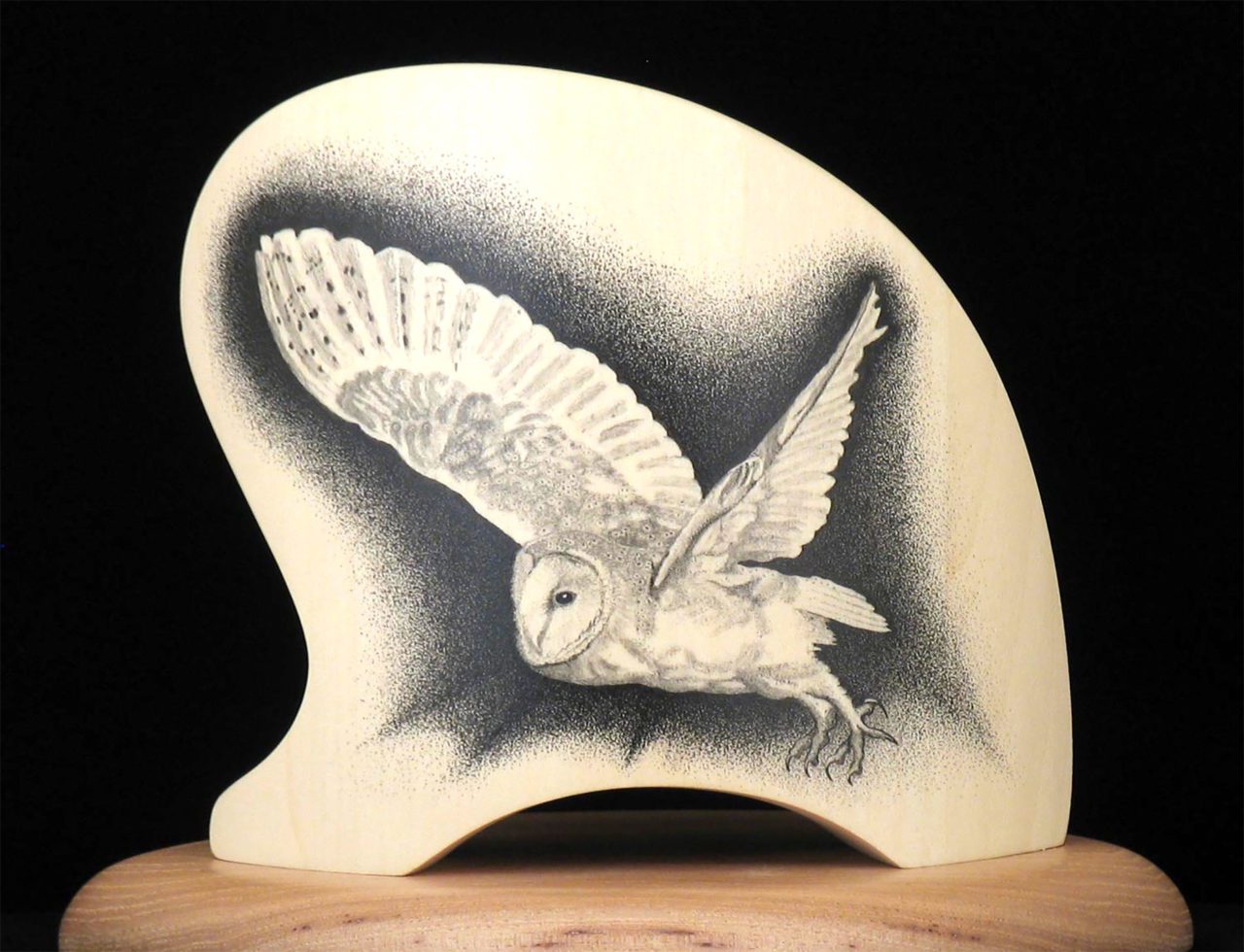 pointillist illustration of a Barn Owl on a piece of wood