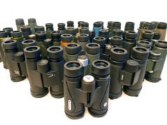 a group of binoculars arranged on a table