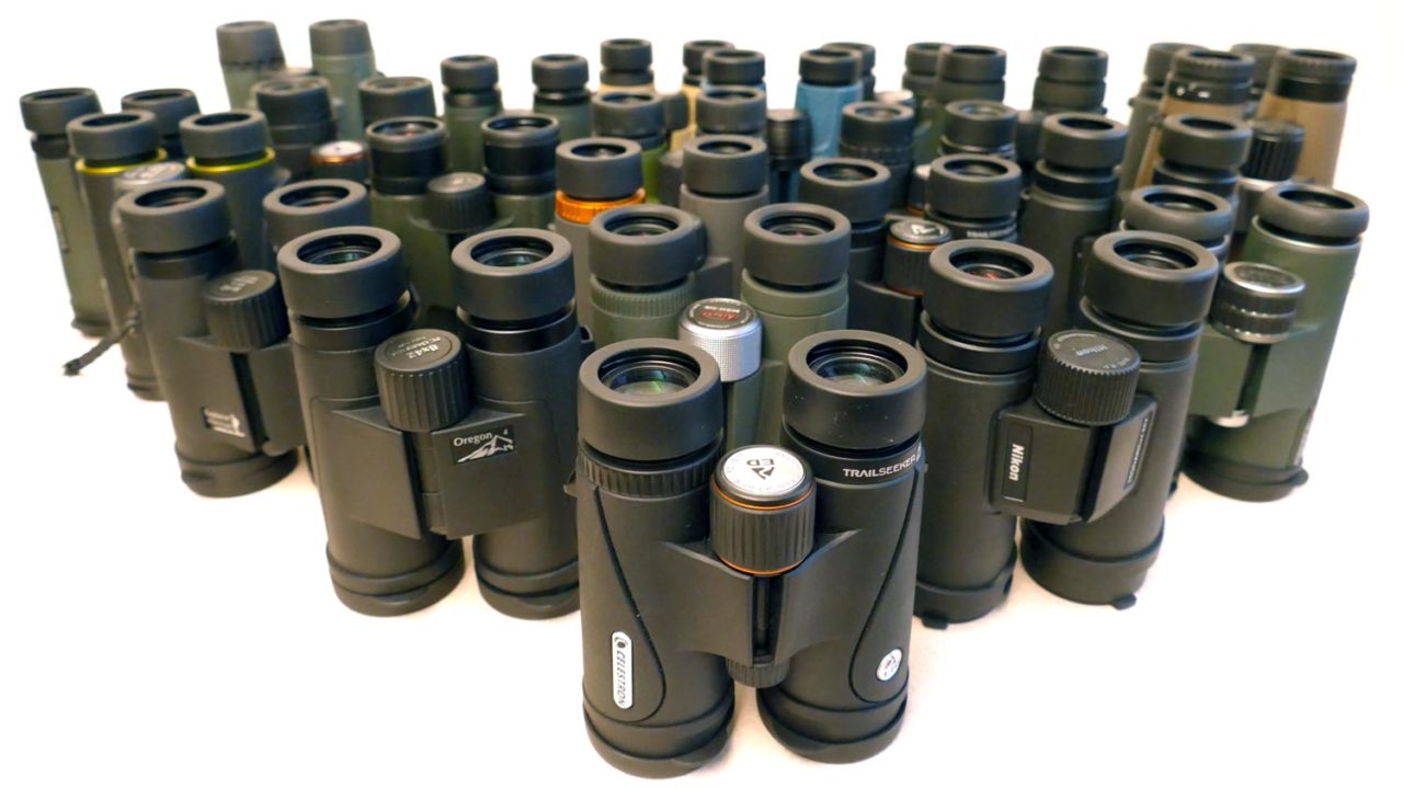  a group of binoculars arranged on a table