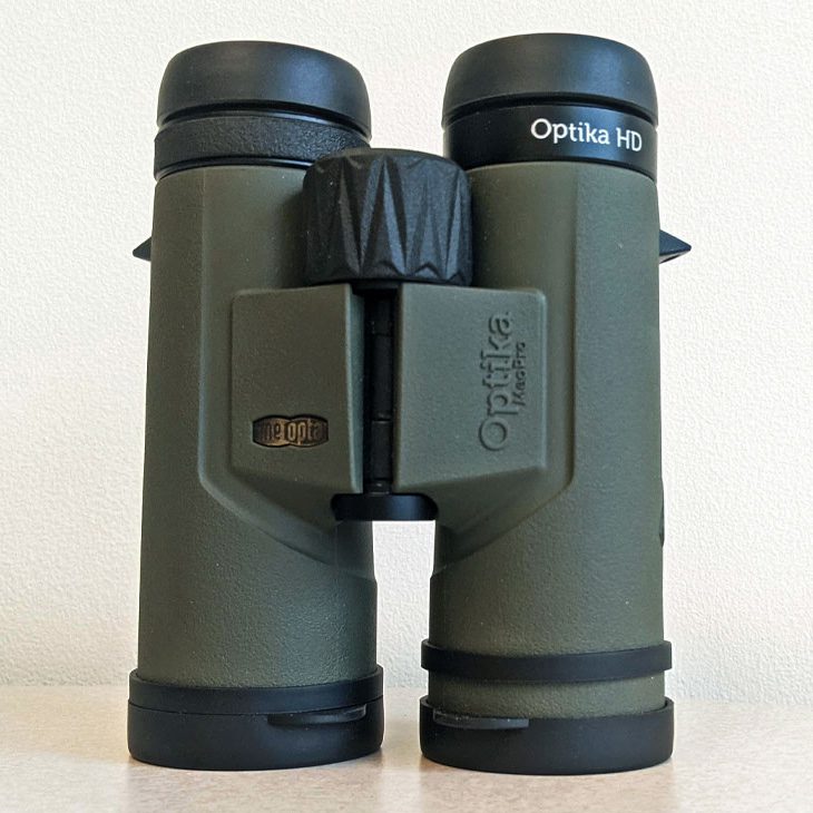 gray/green binoculars with black eye rings, ends and focus wheel
