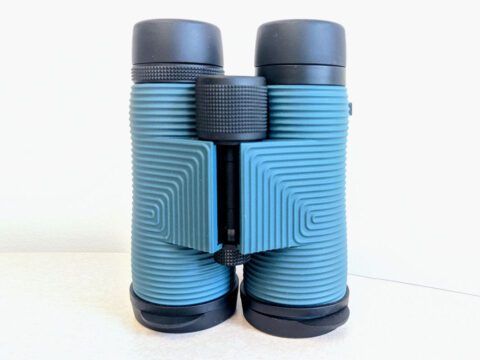Binoculars with blue body and gray ends and eye pieces.